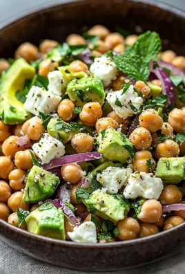 Chickpea Feta Avocado Salad with fresh ingredients in a bowl