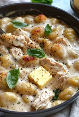 Creamy Chicken Alfredo Gnocchi with fresh herbs and parmesan cheese