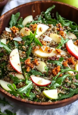 Honey mustard quinoa apple salad with crispy shallots in a bowl