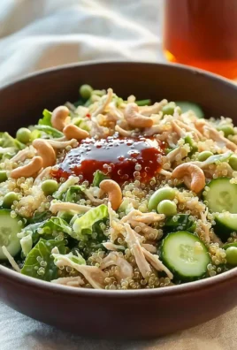 Delicious rotisserie chicken salad with fresh vegetables and dressing