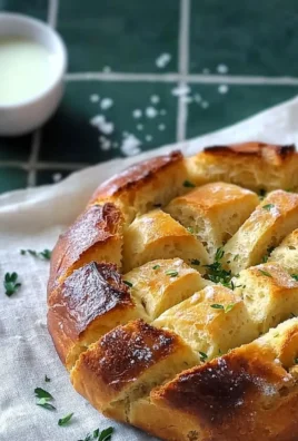 Delicious sourdough discard garlic pull apart bread freshly baked