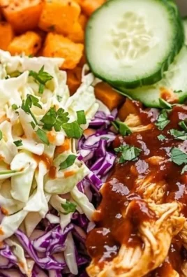 Delicious BBQ Chicken Bowls garnished with fresh vegetables and served in a bowl