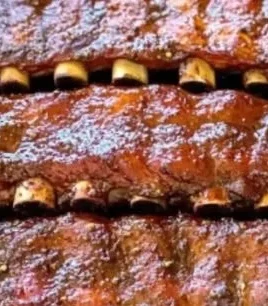 Bobby Flay's mouthwatering dry rub ribs ready to be served