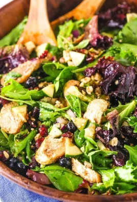 Delicious Chicken Blueberry Feta Salad served in a bowl with fresh ingredients
