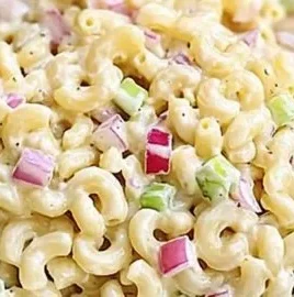 Classic macaroni salad served in a bowl, perfect for summer gatherings.