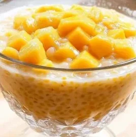 Delicious mango sago dessert in a bowl, perfect for summer.