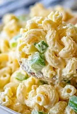Dolly Parton’s Macaroni Salad served in a bowl with vegetables