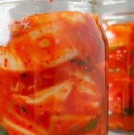 Bowl of easy vegan kimchi seasoned with spices and vegetables