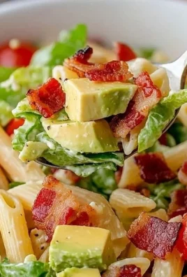 Gluten-free dairy-free BLT pasta salad served in a bowl with fresh ingredients.