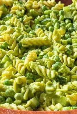 Delicious Green Goddess Pasta Salad with fresh vegetables and herbs