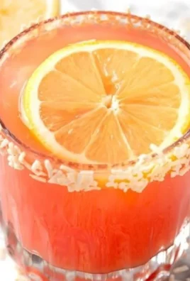 Refreshing guava mocktail in a glass with garnishes