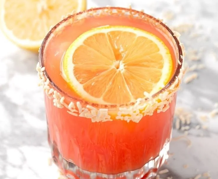 Refreshing guava mocktail in a glass with garnishes