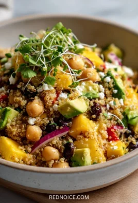 High-Protein Mediterranean Quinoa Salad with fresh vegetables and herbs