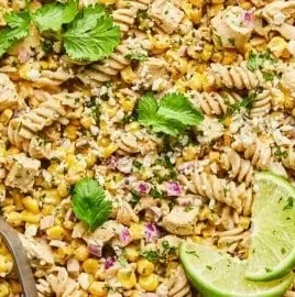 High protein street corn pasta salad with colorful vegetables and dressing