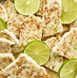 Key Lime Pie Yogurt Bark topped with lime zest and graham cracker pieces