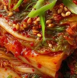 Bowl of homemade kimchi prepared using grandma's traditional recipe