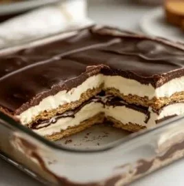 No-bake chocolate éclair dessert with layers of chocolate cream and pastry