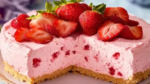 No bake strawberry cheesecake topped with fresh strawberries