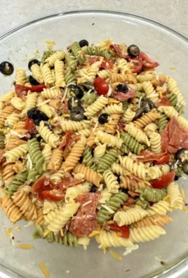 Delicious Olive Garden pasta salad with fresh vegetables and dressing