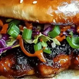 Savory Korean BBQ Chicken Sandwich with crunchy slaw topping