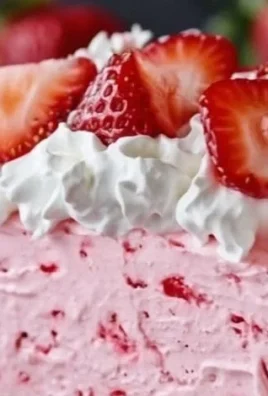 Delicious Strawberry Cool Whip Pie topped with fresh strawberries and whipped cream