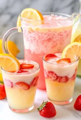 Delicious Strawberry Piña Colada Punch in a party setting