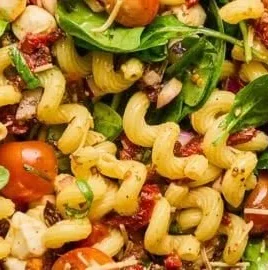 Sun Dried Tomato Pasta Salad with fresh vegetables and herbs