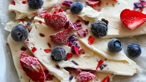 Delicious super easy frozen yogurt bark with colorful toppings ready to serve