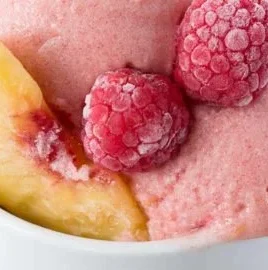 Three ingredient raspberry peach nice cream dessert in a bowl