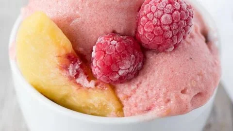 Three ingredient raspberry peach nice cream dessert in a bowl