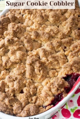 Triple Berry Sugar Cookie Cobbler dessert topped with fresh berries