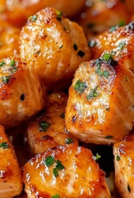 Air Fryer Honey Garlic Salmon Bites cooked to perfection with a sweet glaze.