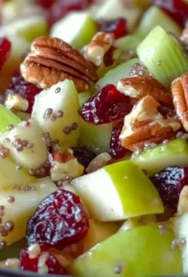 Fresh apple salad with crunchy fruits and nuts