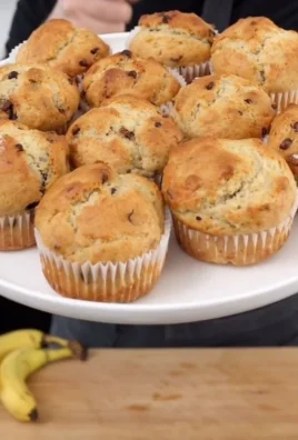 Deliciously baked Banana Bread Muffins cooling on a wire rack