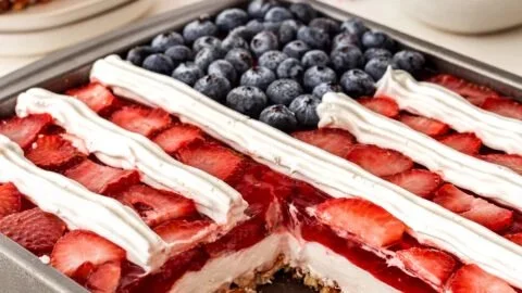 Delicious Strawberry Pretzel Jello Salad layered with strawberries, pretzels, and creamy topping