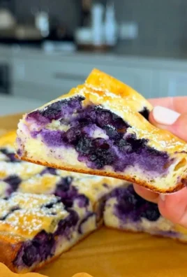 Delicious blender blueberry cottage cheesecake topped with fresh blueberries