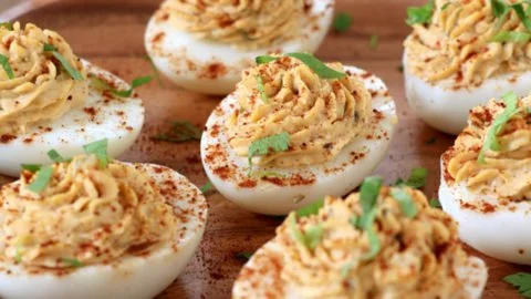 Delicious deviled eggs topped with relish for a flavorful appetizer