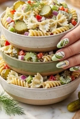 Delicious Dill Pickle Pasta Salad with fresh ingredients in a bowl