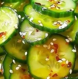 A vibrant bowl of easy Asian cucumber salad with fresh ingredients and sesame dressing