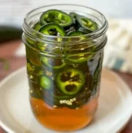 Homemade hot pepper honey recipe featuring fermented jalapeño and honey