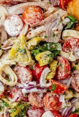 Colorful and fresh Grinder Salad with vegetables and dressing