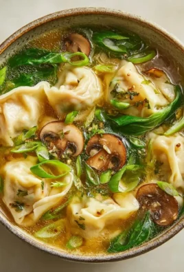 Delicious homemade gyoza soup with fresh ingredients and savory broth