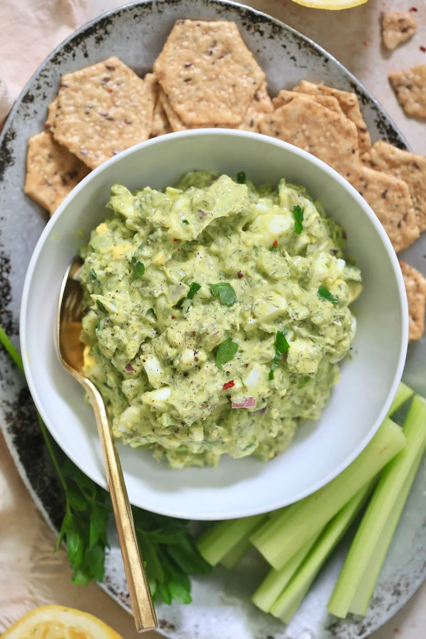 Herby avocado egg salad served in a bowl, perfect for a quick lunch