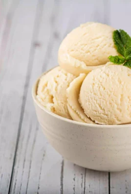Delicious bowl of homemade ricotta gelato topped with fresh fruit