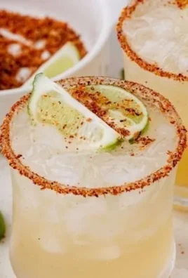 Refreshing Hot Honey Margarita cocktail with spicy honey and lime garnished