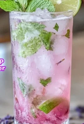 Lavender Mojito Mocktail garnished with fresh lavender and mint leaves