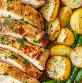 Lemon garlic chicken meal prep in glass containers for healthy eating