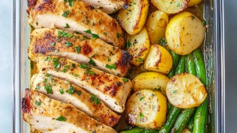Lemon garlic chicken meal prep in glass containers for healthy eating