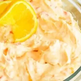 Delicious Mandarin Orange Jello Salad served in a decorative bowl