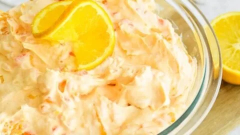 Delicious Mandarin Orange Jello Salad served in a decorative bowl